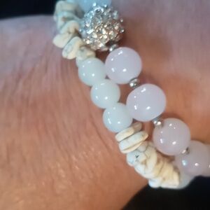 Two beaded bracelets moon stone and rose quartz color.